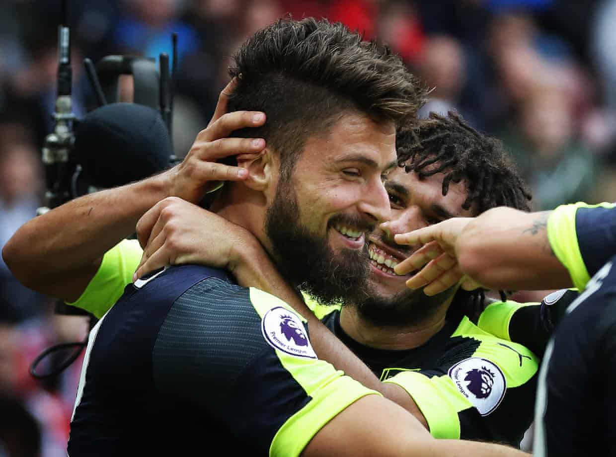 Oliver Giroud celebrates after he scores his second goal and Arsenal’s third.