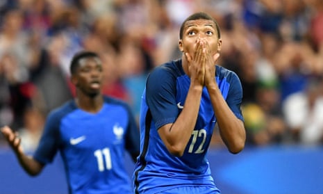France striker Kylian Mbappé reacts after hitting the bar in the 3-2 win over England at the Stade de France in Paris