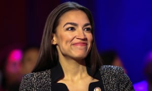 Alexandria Ocasio-Cortez speaks to the media after a televised town hall in New York on 29 March.
