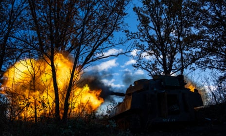 Ukrainian forces fire from a self-propelled howitzers toward Russian positions near Bakhmut, eastern Ukraine