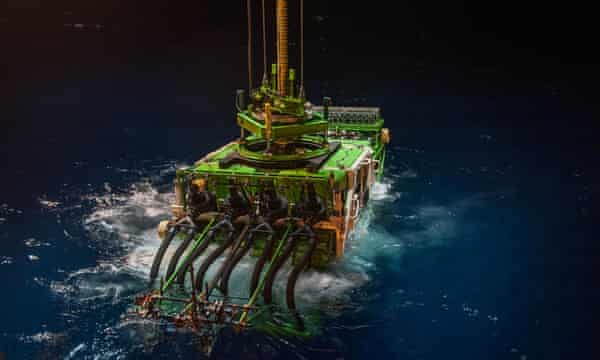 A deep-sea mining robot being lowered into the Pacific Ocean’s Clarion Clipperton zone for trials.