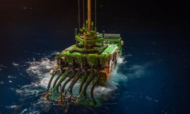 A deep-sea mining robot being lowered into the Pacific Ocean’s Clarion Clipperton zone for trials.