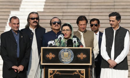 Firdous Ashiq Awan, centre, the special assistant to the prime minister for information and broadcasting, flanked by Imran Khan (third right).