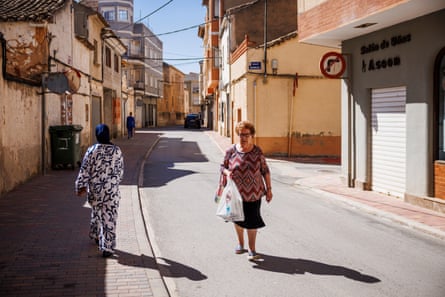 Two people in street of Villamalea