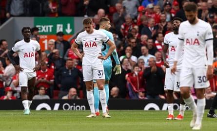 Tottenham players look dejected after their 4-2 loss at Liverpool.
