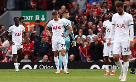 Tottenham players look dejected after their 4-2 loss at Liverpool.