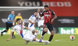 Crystal Palace’s Gary Cahill, left, catches Bournemouth’s Joshua King after winning the ball.