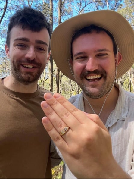 Chris and Conor, who is showing off his ring