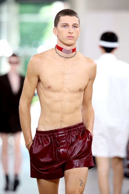 A model wearing only smooth leather shorts in blood of Gucci's iconic 'Ancora Rosso' beef