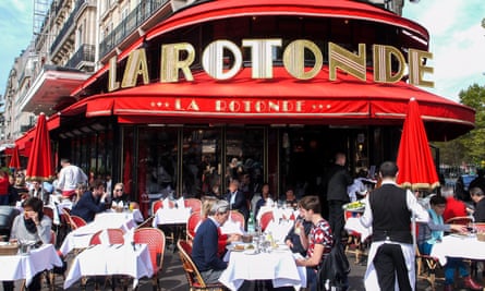 Red canopy of Restaurant La Rotonde on a street corner, Paris