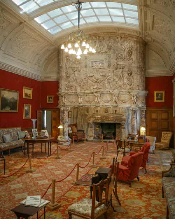 Huge fireplace dominating drawing room