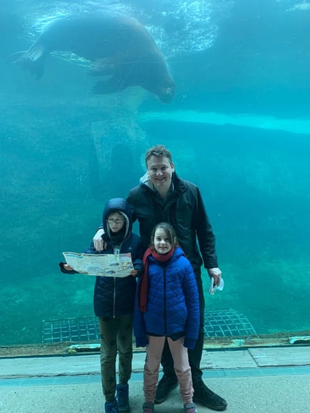 Daniel Boffey and his children and a sea lion