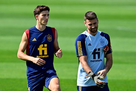 Spain's defender Pau Torres (L) and Spain's goalkeeper Unai Simon take part in a training session yesterday.