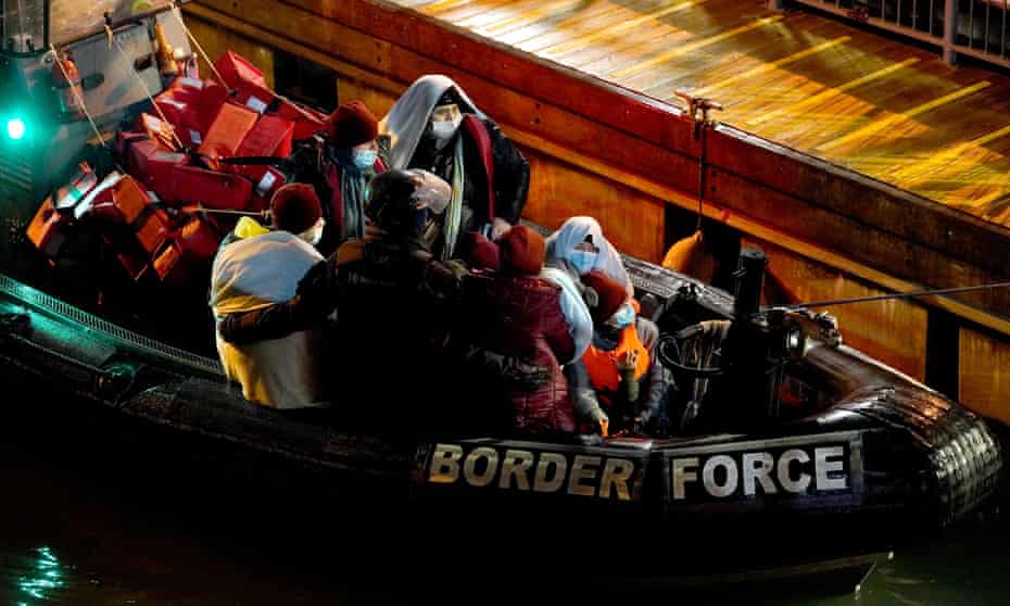 A group of people are brought in to Dover, Kent, onboard a Border Force vessel