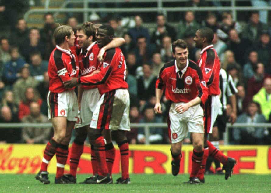 Ian Woan is congratulated by Stuart Pearce and Chris Bart-Williams after scoring against Newcastle in the FA Cup in 1997.