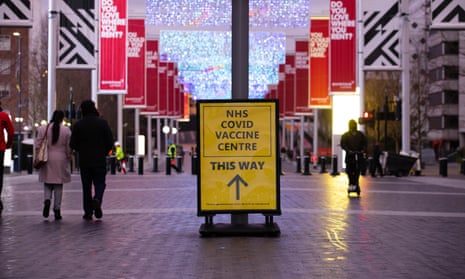 A sign points to a vaccination centre in Wembley, north-west London.