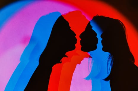 Two lovers silhouette on neon light