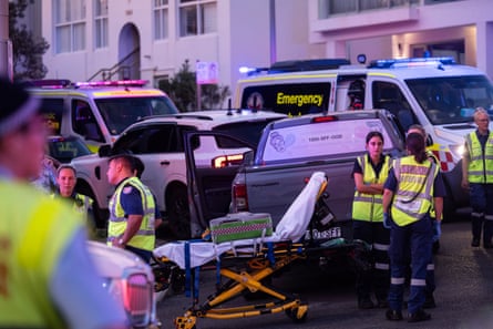 Stretchers are lined up along Campbell Parade at Bondi.