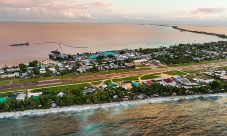 An aerial view of the airstrip in Funafuti, which sits right down the centre of the widest part of the island