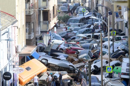 Piled-up cars in a street in Valencia, Spain.