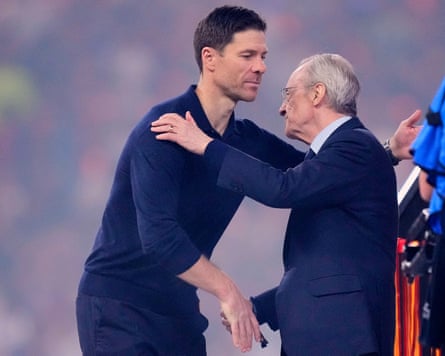 Xabi Alonso and Florentino Pérez shake hands after the Spanish Super Cup final match between Barcelona and Real Madrid