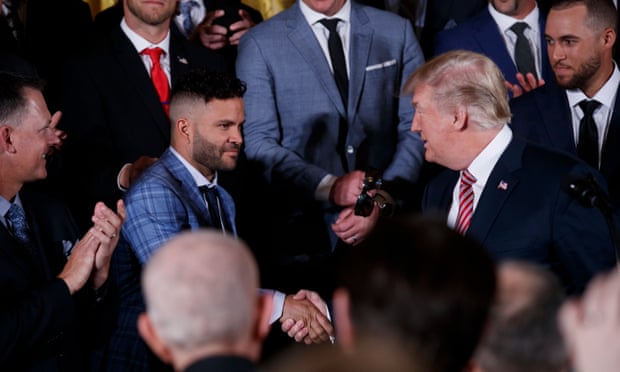 Jose Altuve, one of the best Latino players in the major leagues, greets Donald Trump at a White House reception for the champion Houston Astros