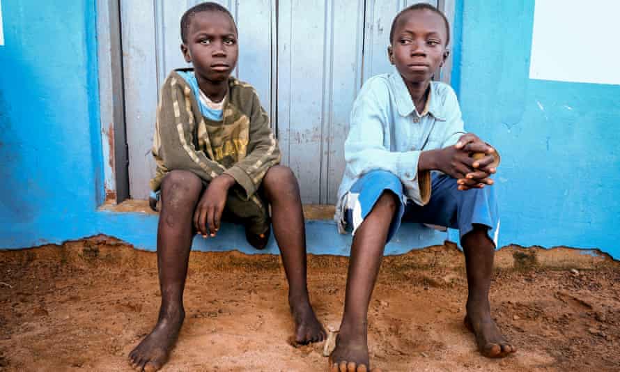 Joe, 10, and Kwame, 12, who were sold by their mother to a fisherman in Ghana