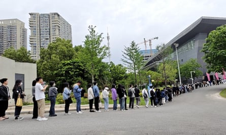A queue at a graduate jobs fair at Jianghan University in Wuhan, China in April.