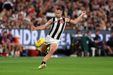 Dan Houston kicks the ball