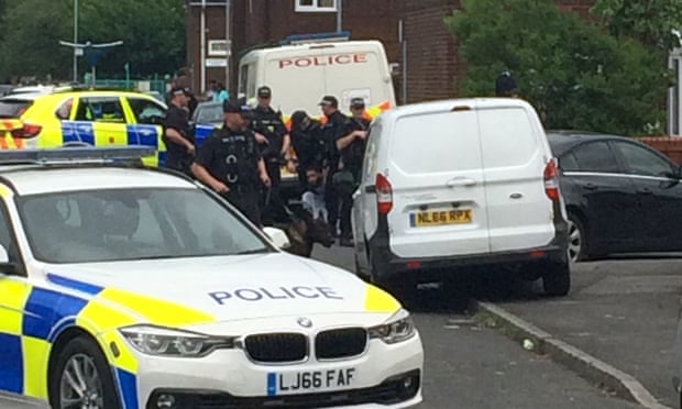 Police raid a property near Quantock Street in Moss Side, Manchester, in connection to last week’s terrorist attack