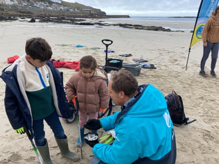 The author's children take part in a beach clean.