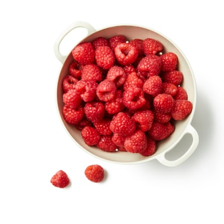A bowl of raspberries.
