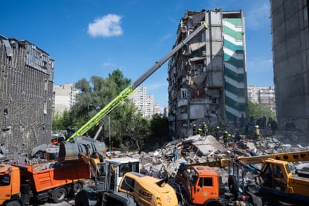 Bombed-out high-rise buildings and cranes