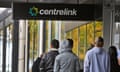 People queuing outside a Centrelink office