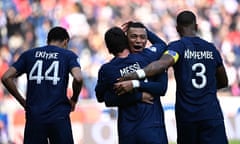 *** BESTPIX *** TOPSHOT-FBL-FRA-LIGUE1-PSG-LILLE<br>TOPSHOT - Paris Saint-Germain's Argentine forward Lionel Messi (C) embraces Paris Saint-Germain's French forward Kylian Mbappe (2nd R), flanked by Paris Saint-Germain's French defender Presnel Kimpembe (R) and Paris Saint-Germain's French forward Hugo Ekitike (L) after the French L1 football match between Paris Saint-Germain (PSG) and Lille LOSC at The Parc des Princes Stadium in Paris on February 19, 2023. (Photo by Anne-Christine POUJOULAT / AFP) (Photo by ANNE-CHRISTINE POUJOULAT/AFP via Getty Images) *** BESTPIX ***