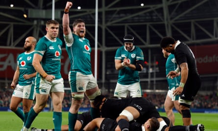 Ireland players celebrate Josh van der Flier’s try.