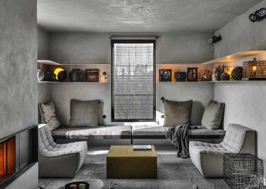 Shades of grey: the chic living room, with windows overlooking Lake Sedan.