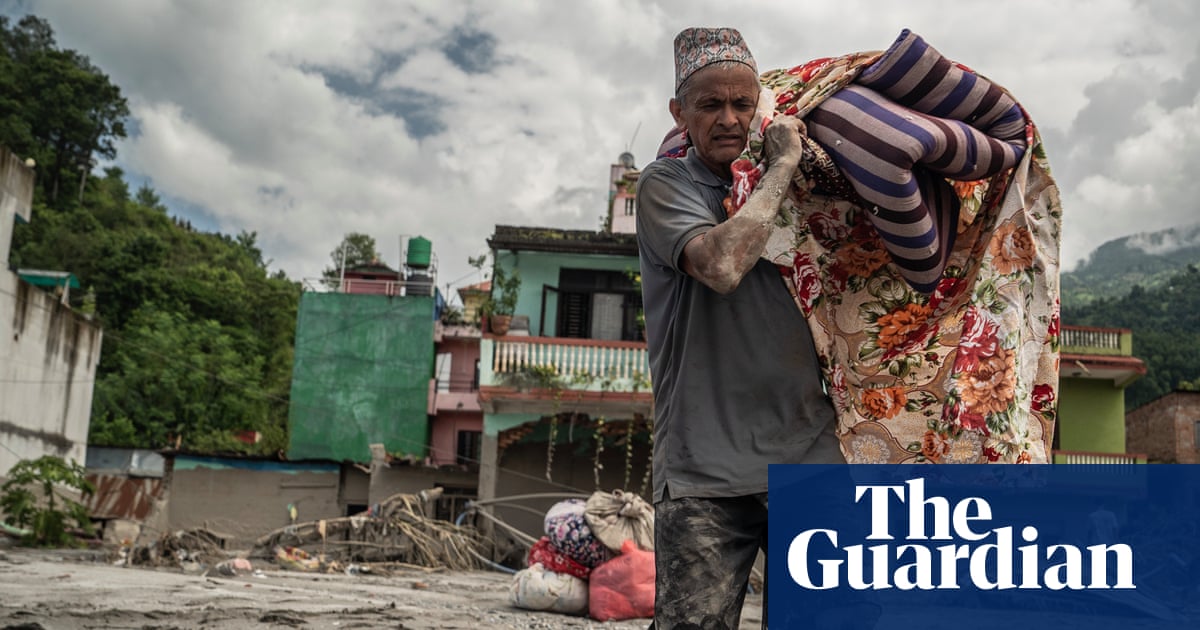 Devastated by floods and overwhelmed by bodies, Nepalis weep for what remains of their homes