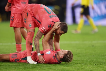 Niclas Füllkrug (lying down) is back in the Bundesliga and banging them in for Werder Bremen.