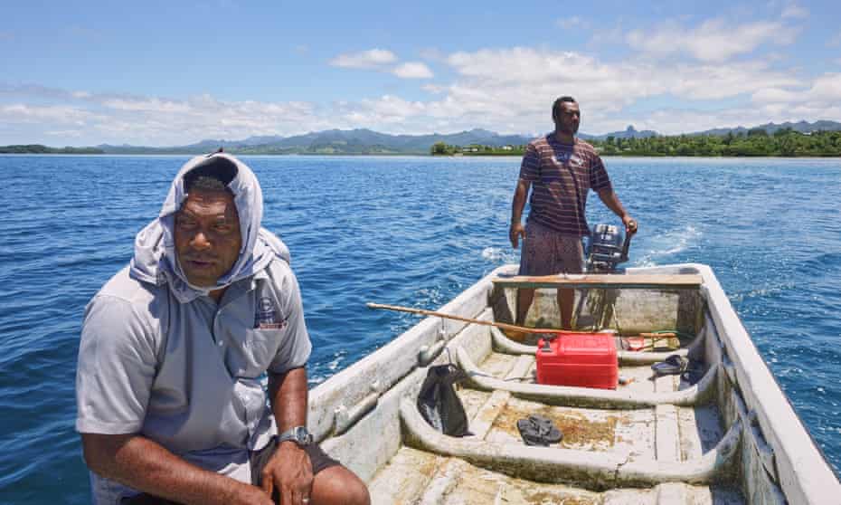 Mosese and Kinikoto collect sea-urchins from the Navakavu Reef, off Fiji’s main island, Viti Levu. The tabu, a traditional marker of fishing grounds, prevents over-fishing. 