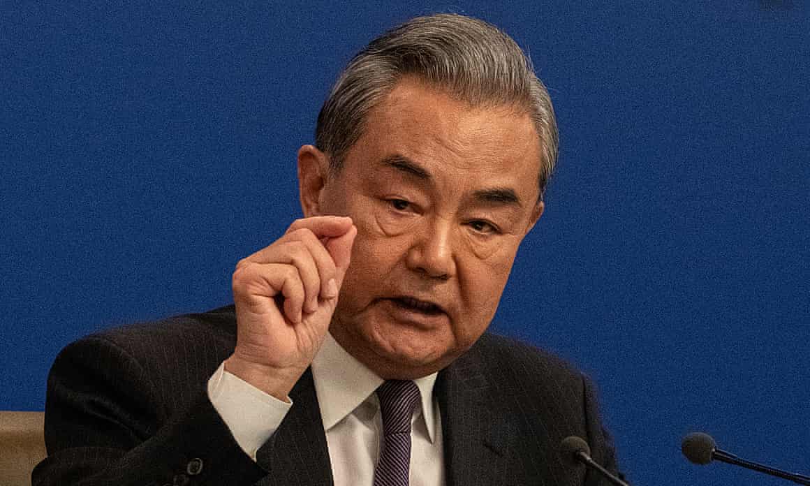 Wang Yi said China would ‘firmly counter’ US pressure.