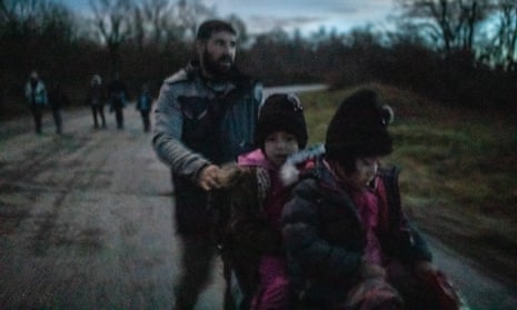 A father from Afghanistan and his children return from the Croatian border after their 54th pushback.