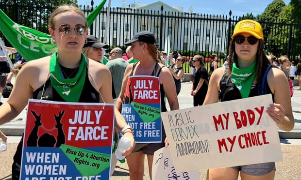 Abortion rights activists protest the supreme court ruling outside the White House in Washington DC.