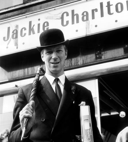 Jack Charlton wears a suit and bowler hat outside a shop his name on it 1967.