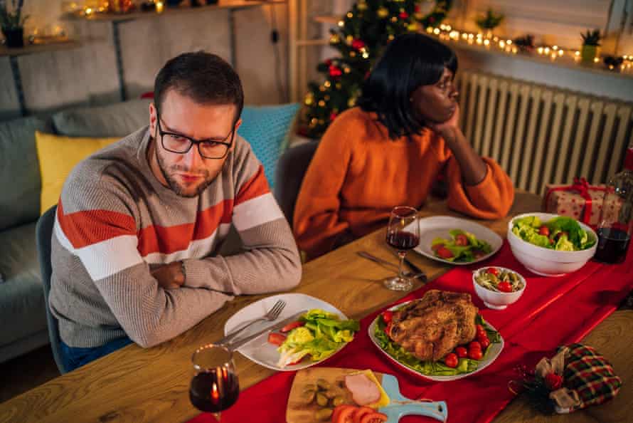Your niece is suddenly vegan! How to survive the 12 disasters of Christmas | Christmas 8 Couple ignoring each other after an argumentYoung unhappy multi ethnic couple ignoring each other after an argument during Christmas dinner