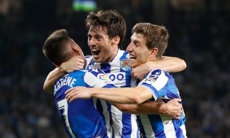 Real Sociedad’s Ander Barrenetxea (left) celebrates with David Silva (centre) and Aihen Muñoz after scoring against Real Madrid