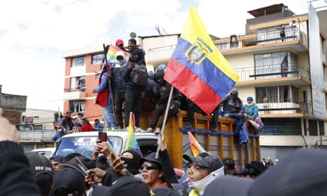 Indigenous demonstrators celebrate the end of the national strikes in Quito, Ecuador