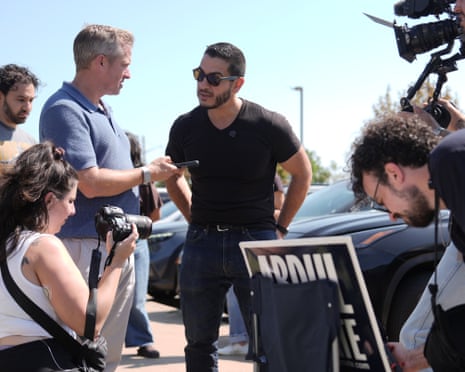 Abdul El-Sayed talks to reporters near the polling place in Dearborn, Michigan.