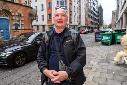 Gary Gainey, a Bristol bus driver, stands on a pavement in Marsh Street in Bristol