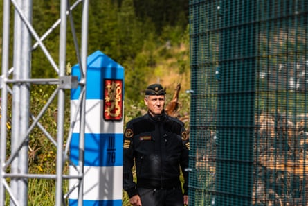 Pitkäniitty in uniform next to a fence.